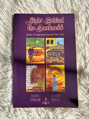 Light Behind the Darkness — Purple Coffee Table Book by Raouf Omar & Claude Weil